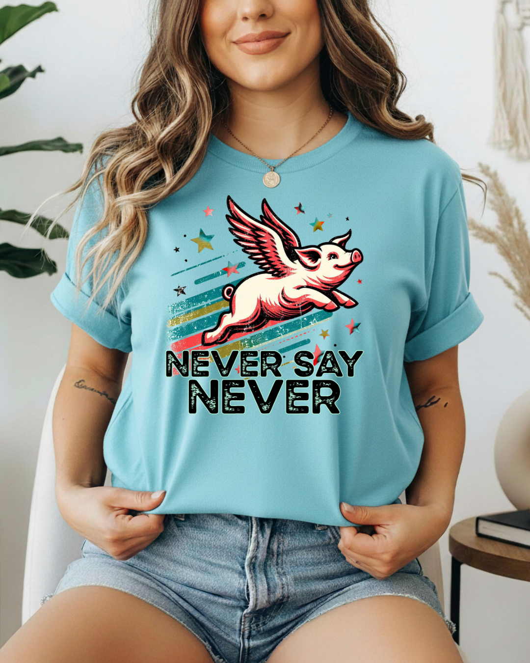 Never Say Never Flying Pig Shirt | Funny Motivational Graphic Tee |  Softstyle T-Shirt